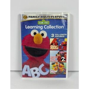 Sesame Street DVD Cover Featuring Elmo in Red with Yellow Nose